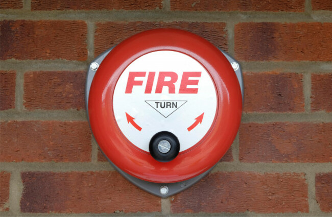 fire-bell-on-brick-wall