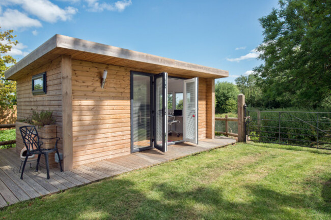 a-home-office-built-into-a-modern-shed-in-the-garden-of-a-home-in-the-uk