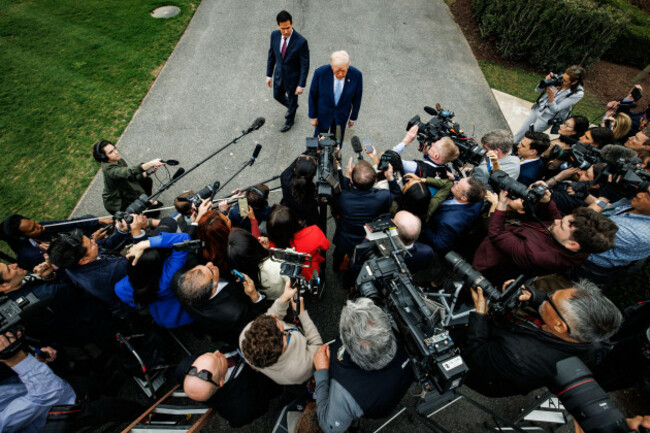 washington-united-states-20th-mar-2026-u-s-president-donald-trump-speaks-to-reporters-with-u-s-secretary-of-state-marco-rubio-before-departing-from-the-south-lawn-of-the-white-house-in-marine-on