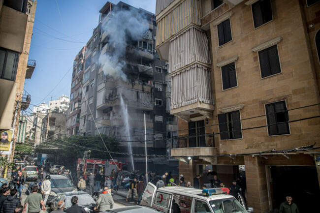 beirut-lebanon-19th-mar-2026-fire-fighters-try-to-put-out-a-fire-following-an-airstrike-in-zoqaq-al-blat-central-beirut-at-least-886-people-have-been-killed-according-to-lebanons-ministry-of-h