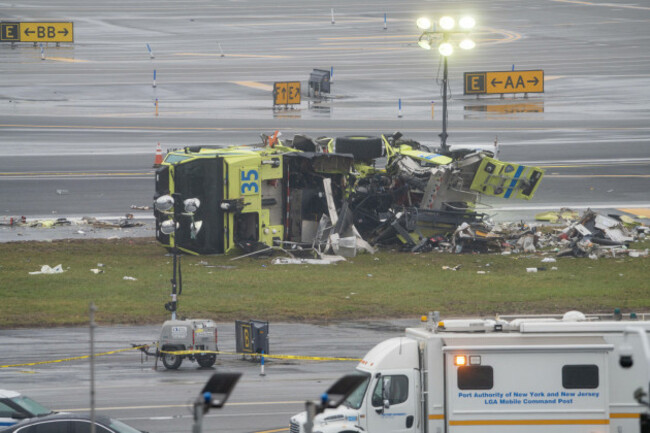 queens-new-york-usa-22nd-mar-2026-a-destroyed-port-authority-emergency-vehicle-is-pictured-after-it-collided-with-an-air-canada-express-plane-at-laguardia-airport-in-queens-new-york-on-sunday