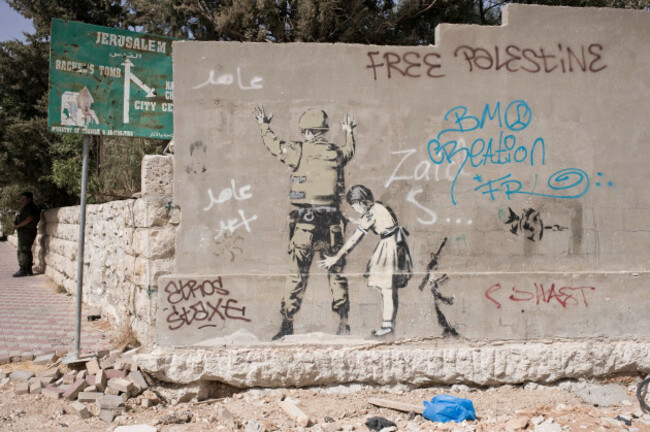 banksy-graffiti-artwork-by-the-world-famous-uk-artist-banksy-in-bethlehem