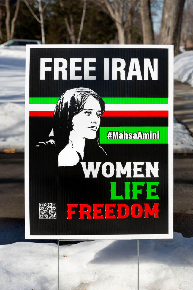 free-iran-protest-yard-sign-with-the-slogan-women-life-freedom-and-a-portrait-of-iranian-woman-mahsa-amina-from-saqqez-kurdistan-province