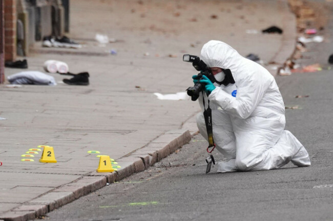 a-forensic-investigator-at-the-scene-in-friar-gate-derby-where-a-number-of-people-had-been-injured-some-of-them-seriously-but-not-life-threatening-after-being-hit-by-a-car-in-the-city-centre-on-s