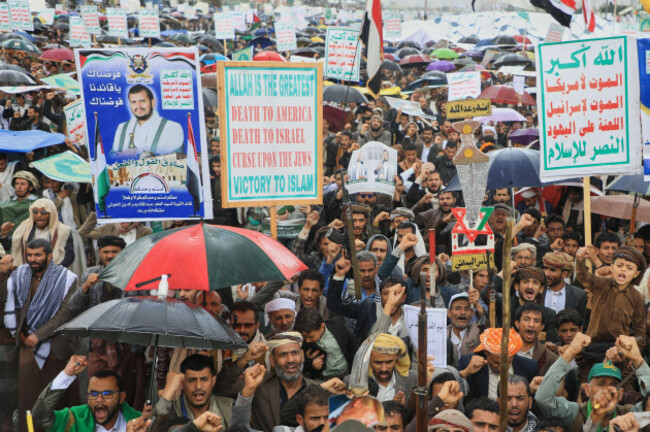 houthi-supporters-shout-slogans-during-a-rally-against-israel-and-the-united-states-war-on-iran-in-sanaa-yemen-friday-march-13-2026-ap-photoosamah-abdulrahman