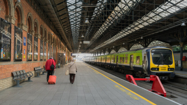 elderly-couple-walking-along-platform-at-connolly-station-dublin-ireland