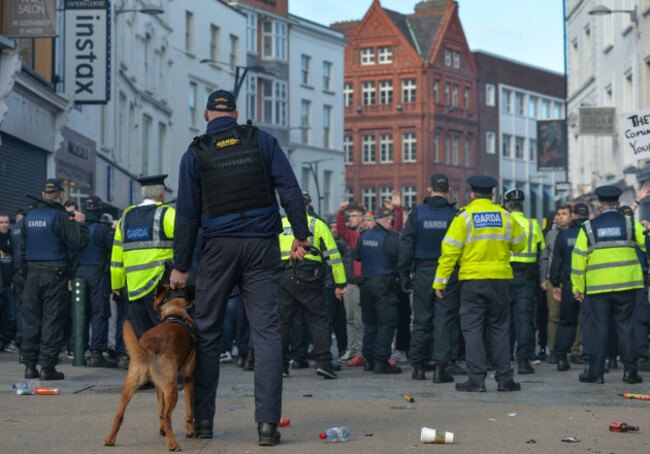 members-of-garda-irish-police-clash-with-protesters-during-anti-lockdown-protest-on-grafton-street-in-dublin-city-center-during-level-5-covid-19-lockdown-on-saturday-fabruary-27-2021-in-dublin