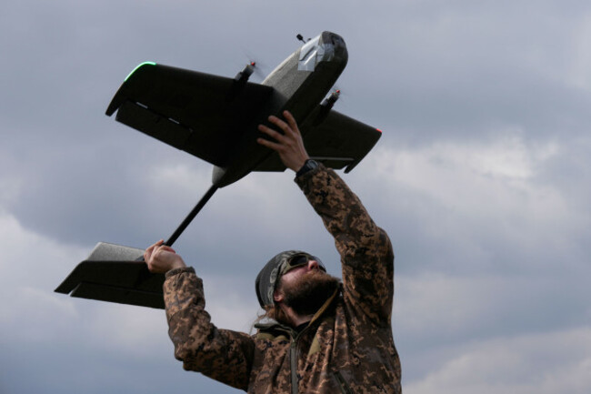 a-student-soldier-of-the-yatagan-school-for-unmanned-aerial-systems-launches-a-training-target-drone-during-drills-in-the-kyiv-region-ukraine-thursday-march-19-2026-ap-photoefrem-lukatsky