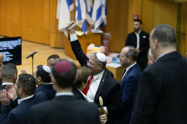 israels-minister-of-national-security-itamar-ben-gvir-center-and-lawmakers-celebrate-after-israels-parliament-passed-a-law-approving-the-death-penalty-for-palestinians-convicted-of-murdering-isra