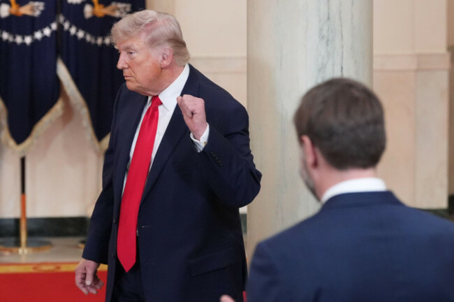 as-vice-president-jd-vance-watches-president-donald-trump-gestures-after-speaking-about-the-iran-war-from-the-cross-hall-of-the-white-house-on-wednesday-april-1-2026-in-washington-ap-photoalex