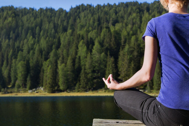 yoga-and-meditation-near-mountain-lake