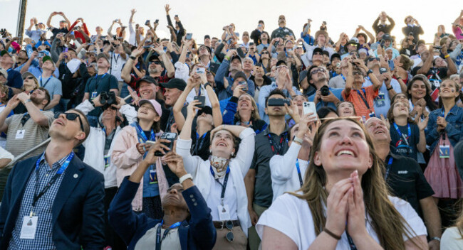 kennedy-space-center-united-states-of-america-01-april-2026-guests-at-the-banana-creek-viewing-site-watch-with-excitement-as-the-nasa-artemis-ii-space-launch-system-rocket-carrying-the-orion-space