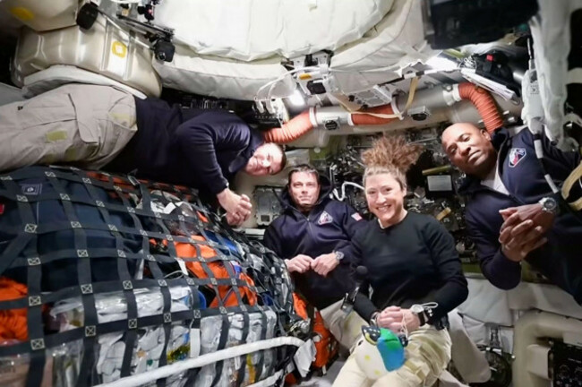 this-image-taken-from-video-provided-by-nasa-shows-the-artemis-ii-crew-from-left-canadien-astronaut-and-mission-specialist-jeremy-hansen-commander-reid-wiseman-mission-specialist-christina-koch-an