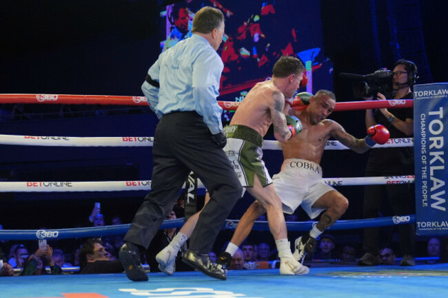 irelands-feargal-mccrory-center-knocks-down-keenan-carbajal-during-the-eighth-round-of-a-super-lightweight-boxing-match-sunday-march-16-2025-in-new-york-ap-photofrank-franklin-ii