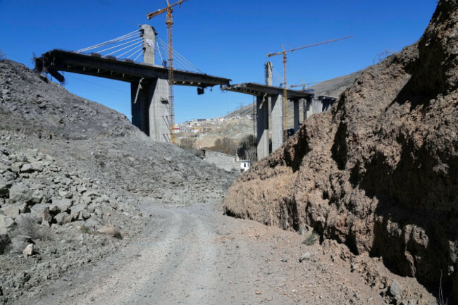 a-newly-constructed-bridge-struck-by-u-s-airstrikes-thursday-is-seen-in-karaj-west-of-tehran-iran-friday-april-3-2026-ap-photovahid-salemi