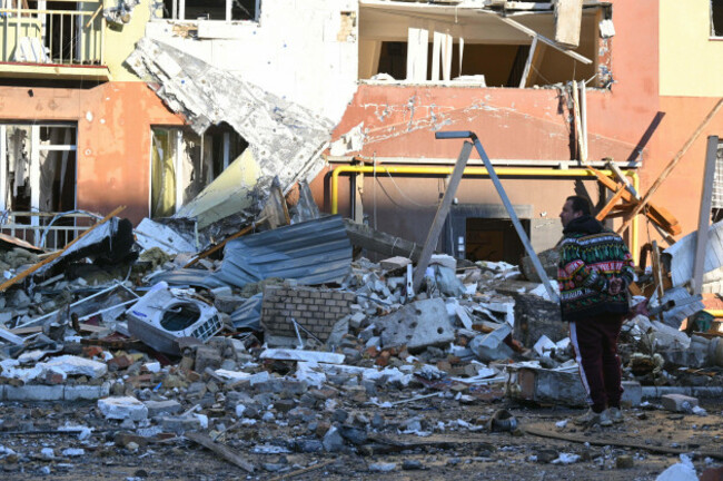 a-local-man-stands-in-front-of-residential-building-which-was-heavily-damaged-after-a-russian-strike-in-odesa-ukraine-monday-april-6-2026-ap-photomichael-shtekel