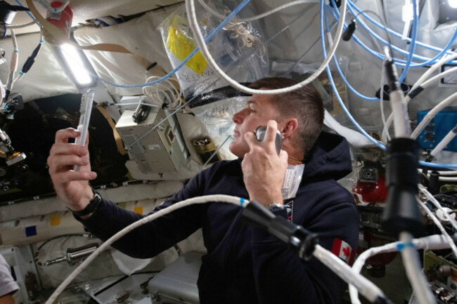 in-this-photo-provided-by-nasa-artemis-ii-mission-specialist-and-csa-canadian-space-agency-astronaut-jeremy-hansen-enjoys-a-shave-inside-the-orion-spacecraft-during-flight-day-5-and-ahead-of-the-cr