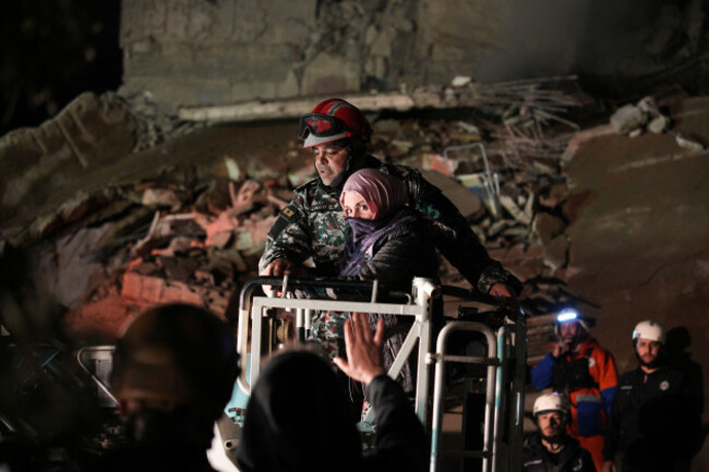 a-woman-who-survived-an-israeli-airstrike-is-rescued-by-a-firefighter-from-a-destroyed-building-in-central-beirut-lebanon-wednesday-april-8-2026-ap-photoemilio-morenatti
