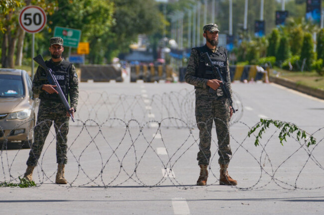 soldiers-stand-guard-at-a-checkpoint-to-ensure-security-ahead-of-the-united-states-and-iran-possible-negotiations-in-pakistani-capital-in-islamabad-pakistan-friday-april-10-2026-ap-photoanjum