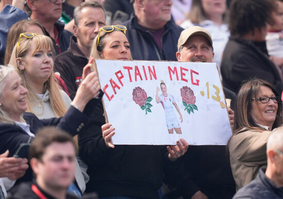 fans-hold-a-sign-for-englands-megan-jones-during-the-guinness-womens-six-nations-2026-match-at-the-allianz-stadium-london-picture-date-saturday-april-11-2026