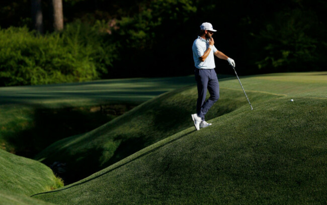 augusta-united-states-10th-apr-2026-cameron-young-stands-next-to-his-ball-after-it-landed-on-the-lip-leading-to-raes-creek-during-the-second-day-of-the-masters-tournament-at-augusta-national-golf