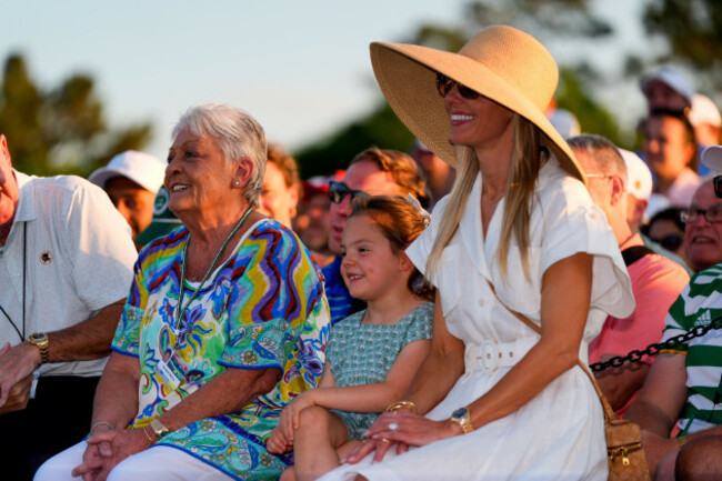 from-left-rory-mcilroys-mother-rosie-mcilroy-daughter-poppy-and-wife-erica-stoll-wait-for-the-green-jacket-ceremony-after-the-masters-golf-tournament-at-the-augusta-national-golf-club-sunday-apr
