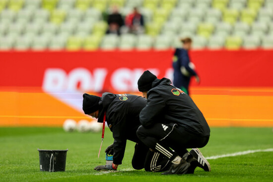a-view-of-the-groundsmen-tending-to-the-pitch-ahead-of-the-match