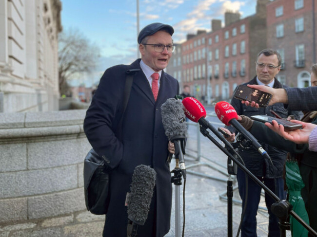 minister-for-communities-media-and-sport-patrick-odonovan-speaking-to-members-of-the-media-outside-government-buildings-in-dublin-about-about-postage-stamps-and-the-arts-council-on-his-way-into-cab
