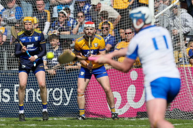 conor-leen-and-eibhear-quilligan-watch-stephen-bennett-take-a-free-at-the-end-of-the-game