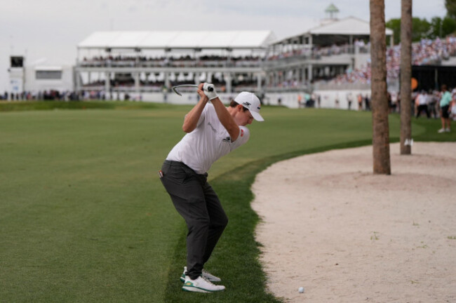 matt-fitzpatrick-of-england-hits-from-a-waste-area-on-the-18th-hole-during-the-final-round-of-the-rbc-heritage-golf-tournament-sunday-april-19-2026-in-hilton-head-s-c-ap-photomike-stewart