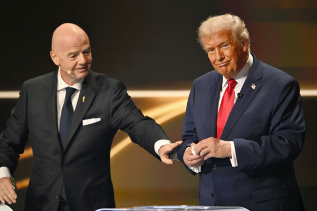 fifa-president-gianni-infantino-pauses-president-donald-trump-during-the-draw-for-the-2026-soccer-world-cup-at-the-kennedy-center-in-washington-friday-dec-5-2025-mandel-nganpool-photo-via-ap