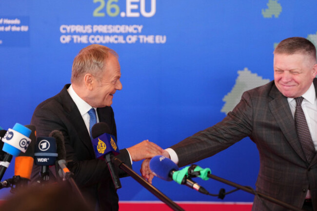 slovakias-prime-minister-robert-fico-right-speaks-with-polands-prime-minister-donald-tusk-as-he-arrives-for-the-eu-summit-in-nicosia-cyprus-friday-april-24-2026-ap-photopetros-karadjias