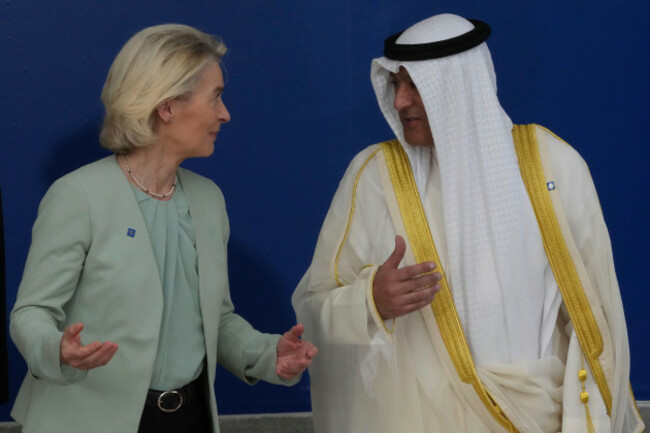 european-commission-president-ursula-von-der-leyen-left-speaks-with-the-gulf-cooperation-council-secretary-general-jasem-mohamed-albudaiwi-before-a-family-photo-of-the-eu-summit-in-nicosia-cyprus