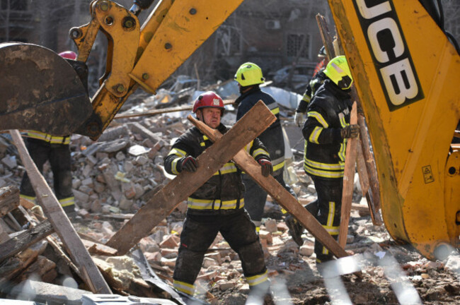a-rescue-worker-clears-the-rubble-after-a-russian-strike-on-residential-neighbourhood-of-dnipro-ukraine-saturday-april-25-2026-ap-photomykola-synelnykov