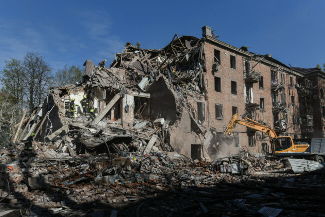 rescue-workers-clear-the-rubble-of-a-residential-building-destroyed-by-a-russian-strike-in-dnipro-ukraine-saturday-april-25-2026-ap-photomykola-synelnykov