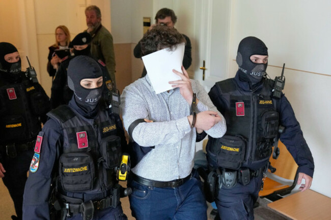 defendant-beran-a-wears-a-new-shirt-as-he-is-returned-to-the-courtroom-in-the-district-court-in-wiener-neustadt-austria-where-he-stands-trial-for-plotting-to-carry-out-an-attack-on-one-of-superstar