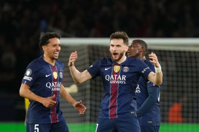 psgs-khvicha-kvaratskhelia-center-scelebrates-after-scoring-his-sides-first-goal-during-a-champions-league-semifinal-first-leg-soccer-match-between-paris-saint-germain-and-bayern-munich-in-paris