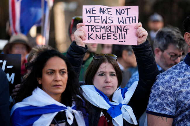 people-protest-near-the-scene-in-golders-green-north-west-london-after-two-men-one-aged-in-his-70s-and-another-in-his-30s-were-stabbed-on-wednesday-morning-the-metropolitan-police-said-a-45-yea