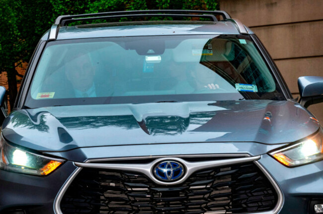 corrects-city-and-state-former-fbi-director-james-comey-leaves-the-alexandria-federal-courthouse-in-the-backseat-of-a-car-driven-by-his-lawyers-jessica-carmichael-driver-and-patrick-fitzgerald-fr
