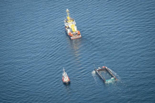 fehmarn-germany-29th-apr-2026-the-whale-is-transported-by-two-tugboats-in-a-flooded-cargo-ship-off-the-danish-coast-on-wednesday-morning-photo-taken-from-an-airplane-the-humpback-whale-recovere
