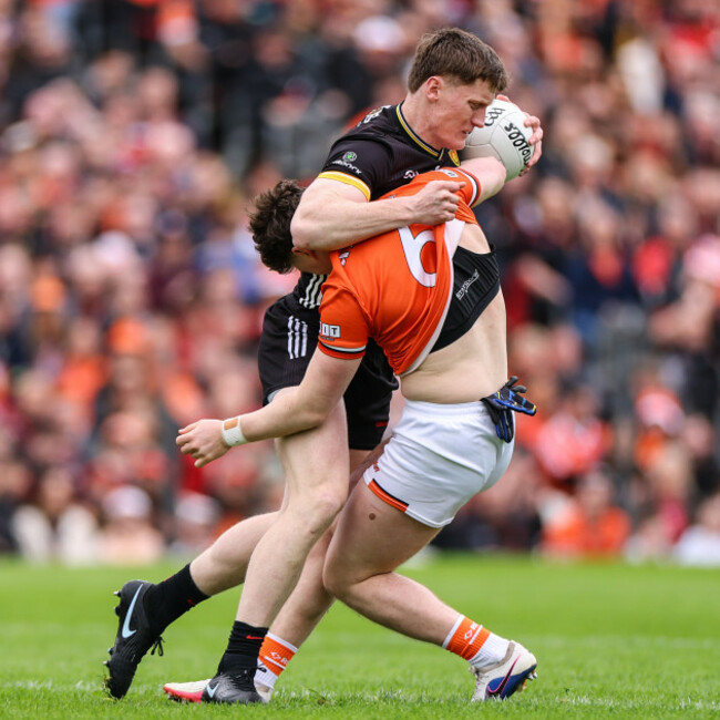 daniel-guinness-is-tackled-by-tiernan-kelly