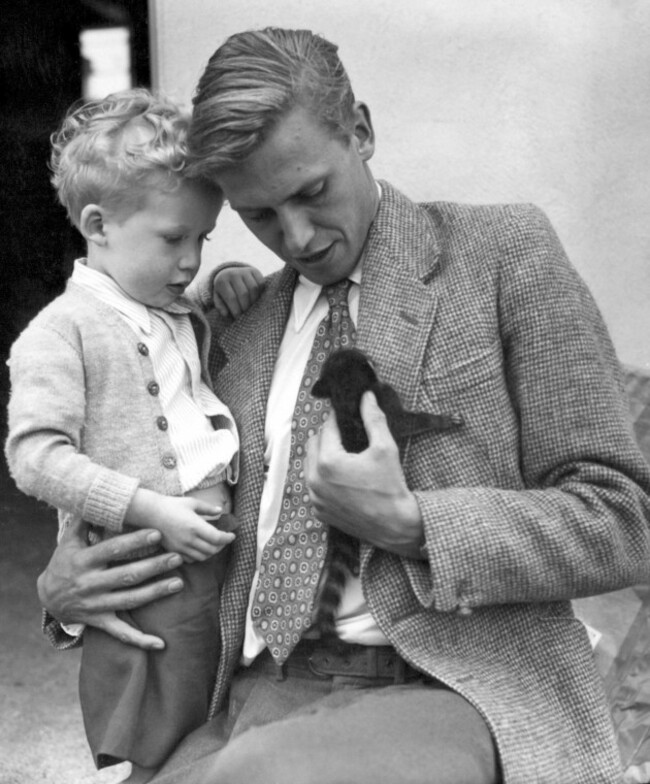 david-attenborough-holding-his-son-robert-whilst-looking-at-an-animal-called-a-coatimundi-brought-home-from-the-combined-london-zoo-bbc-expedition-to-british-guiana