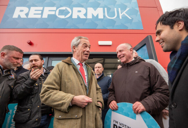manchester-uk-05th-feb-2026-nigel-farage-meets-and-greets-reform-uk-supporters-during-the-campaign-nigel-farages-campaign-visit-to-gorton-and-denton-where-he-opened-by-cutting-a-light-blue-ribb