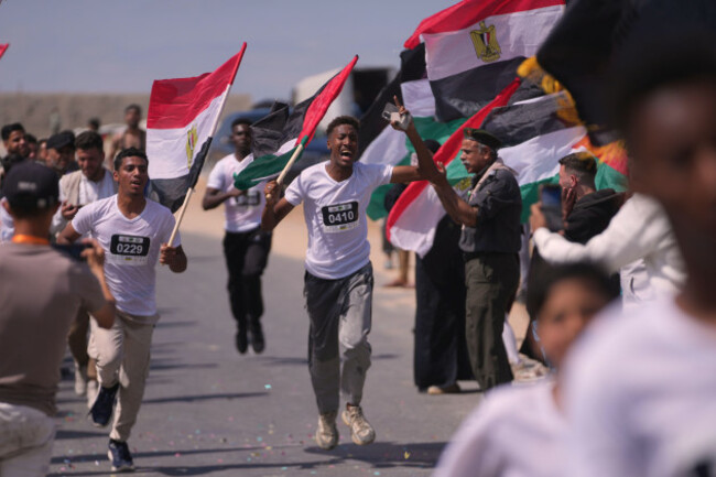 palestinian-runners-take-part-in-the-5-kilometer-palestine-marathon-along-the-coastal-road-near-nuseirat-in-the-central-gaza-strip-friday-may-8-2026-ap-photoabdel-kareem-hana