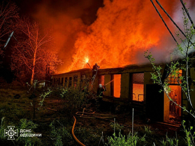 in-this-photo-provided-by-the-ukrainian-emergency-service-firefighters-put-out-a-fire-a-building-following-a-russian-drone-attack-in-odesa-region-ukraine-saturday-may-2-2026-ukrainian-emergency