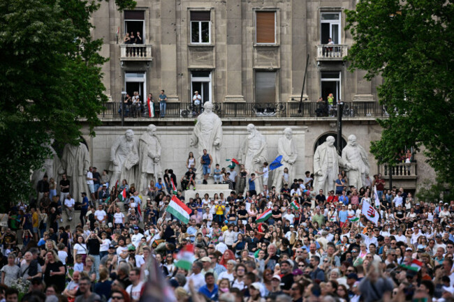 people-gathered-in-front-of-the-hungarian-parliament-after-hungarian-prime-minister-peter-magyar-took-his-oath-of-office-in-budapest-hungary-saturday-may-9-2026-ap-photodenes-erdos