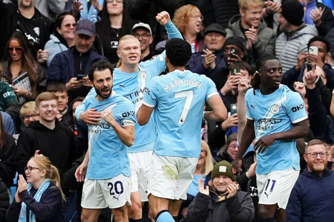 manchester-citys-erling-haaland-second-left-celebrates-with-team-mates-after-scoring-their-sides-second-goal-during-the-premier-league-match-at-etihad-stadium-manchester-picture-date-saturday-m