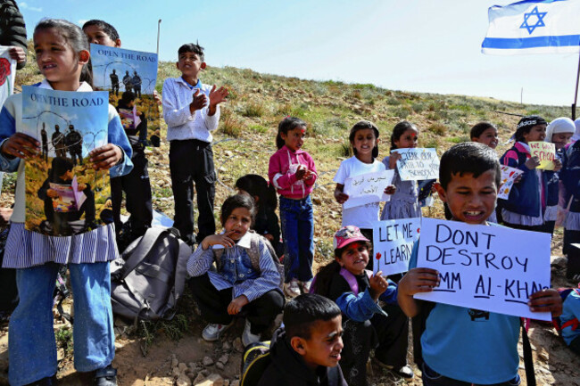 palestinian-children-ask-to-open-the-road-to-school-in-front-of-a-barbed-wire-fence-set-up-by-israeli-settlers-near-the-village-of-umm-al-khair-the-west-bank-on-april-26-2026-the-yomiuri-shimbun