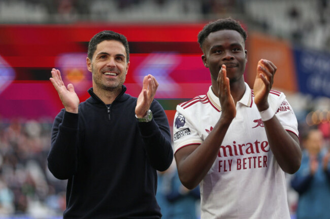 arsenals-manager-mikel-arteta-and-bukayo-saka-reacts-after-the-premier-league-soccer-match-between-west-ham-and-arsenal-in-london-sunday-may-10-2026-ap-photoian-walton