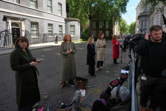 tv-presenters-report-from-downing-street-in-london-tuesday-may-12-2026-as-britains-prime-minister-keir-starmer-is-facing-the-biggest-threat-yet-to-his-authority-after-a-growing-number-of-disaffect